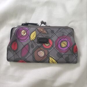 Relic wallet with clasp closure